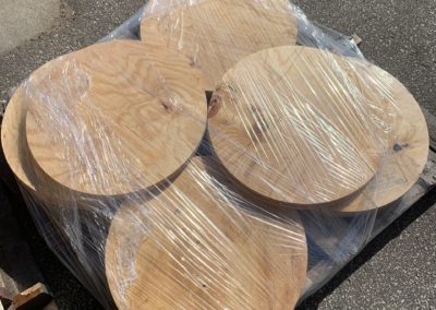 Plywood circles and flange covers at Fox Valley Wood Products.