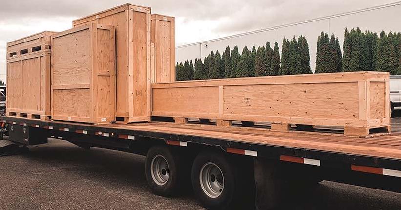 shipping crates on a flatbed truck